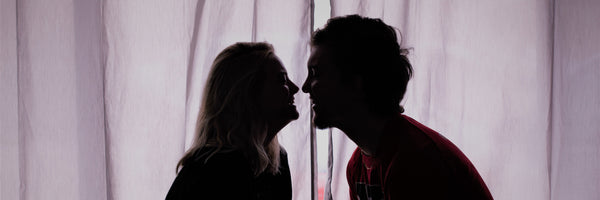 Man and woman couple smiling cuddling Entrainment body rhythm